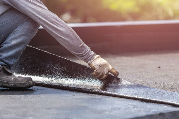 Professional Basement Waterproofing technician working in Islandia, NY